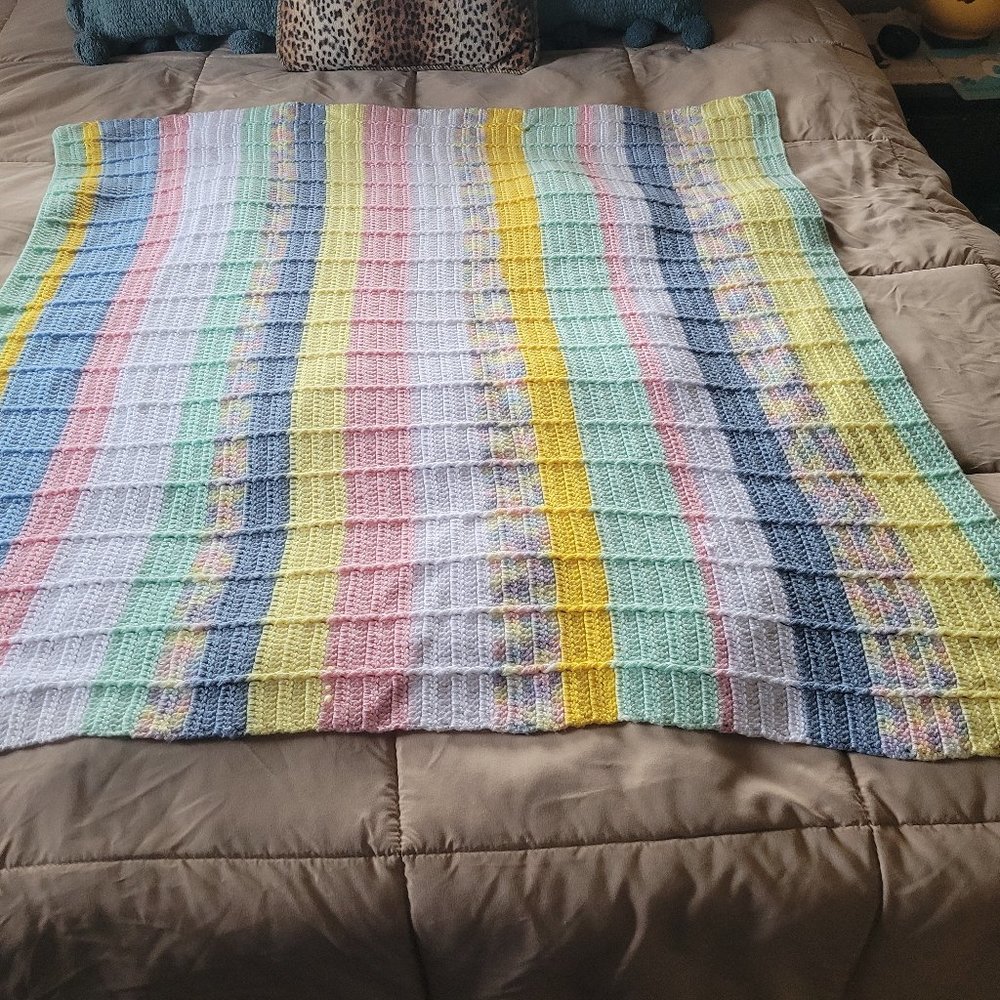 Muliti-colored crocheted baby blanket